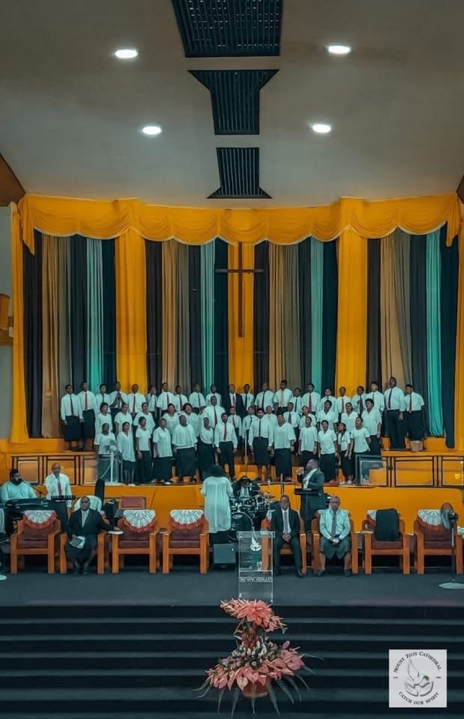 Pastor leading a worship service at Mount Zion Cathedral
