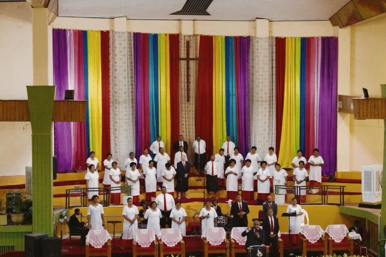 Church choir and leaders gathered on the stage